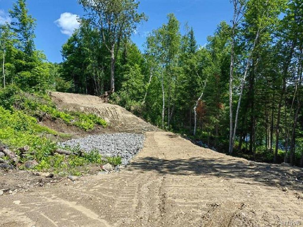 Terrain vacant au bord de la Rivière Rouge, Brébeuf - vacant lot bordered by the Rivière Rouge, Brébeuf — photo 2