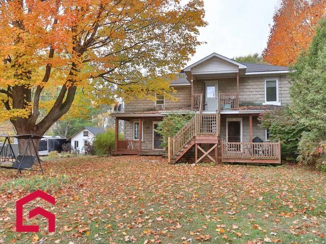 573 577 Ch. Bord-de-l'eau S. — photo 2