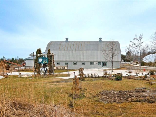 1580 Route 112 O. — photo 1