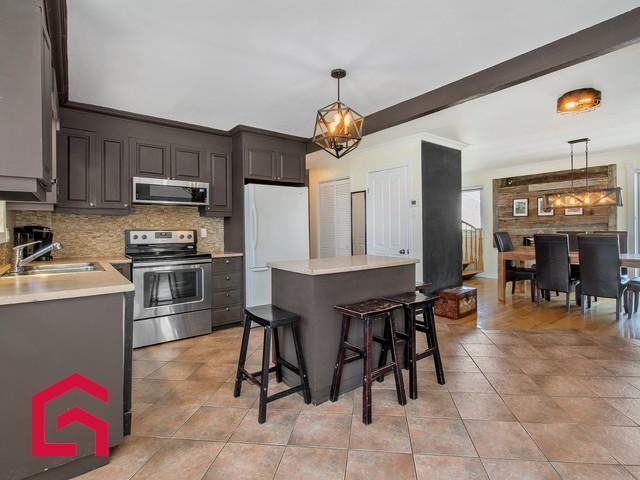 81 25e Avenue — photo 2