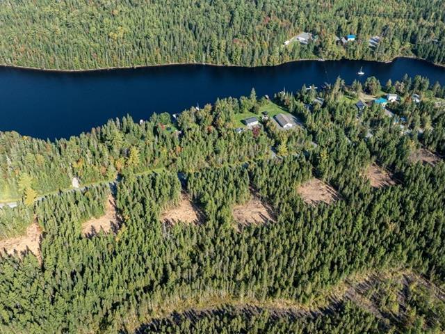 Grand Lac St-François, Lambton en Estrie. Wow! Rareté, superbe terrain vacant bâtissable de 49 402 pi.ca. ACCÈS et DROIT DE QUAI au lac à proximité. — photo 1