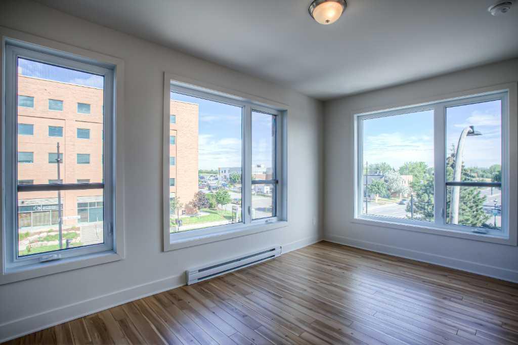 APPARTEMENT 4 1\2 + GRAND BALCON PRIVÉ + STATIONNEMENT 5