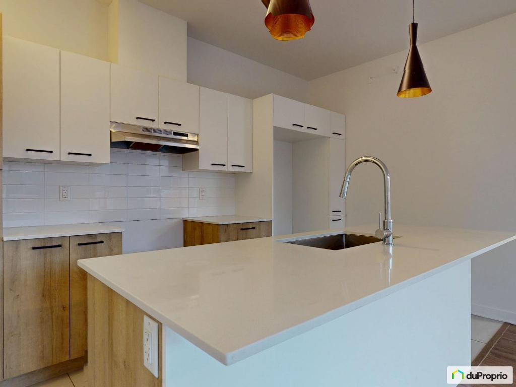 3 1/2 Condo spacieux, très très lumineux, 5 électro + station. int. 4