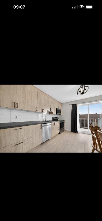 127 Boul. Lacombe apt 2 — photo 1