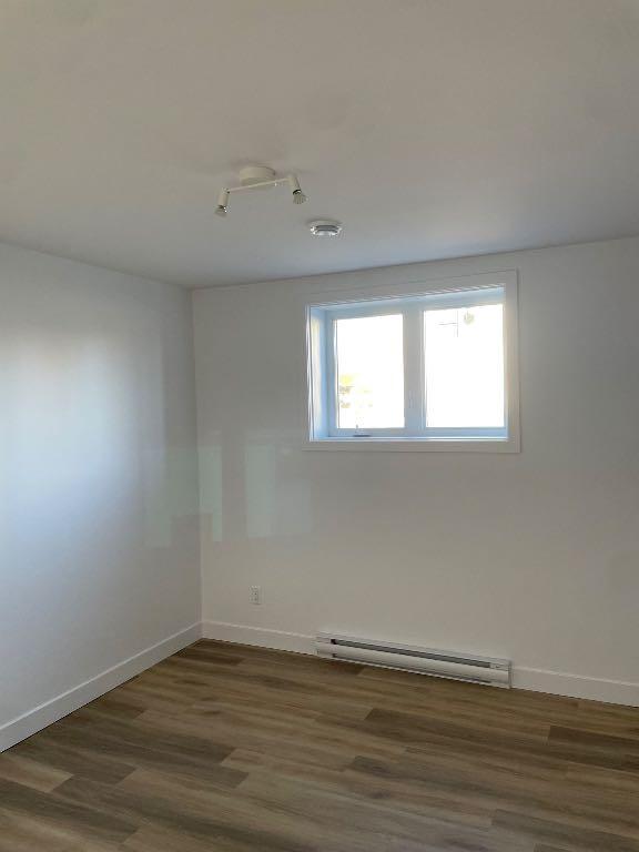 Grands 5½ - Demi-sous-sol, construction neuve 4