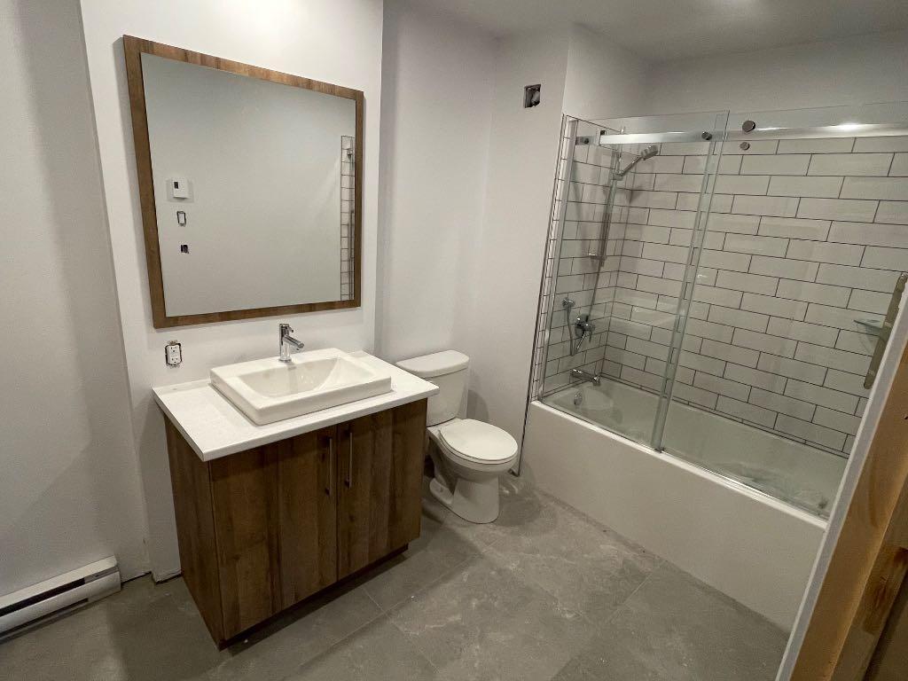 Grands 5½ - Demi-sous-sol, construction neuve 5