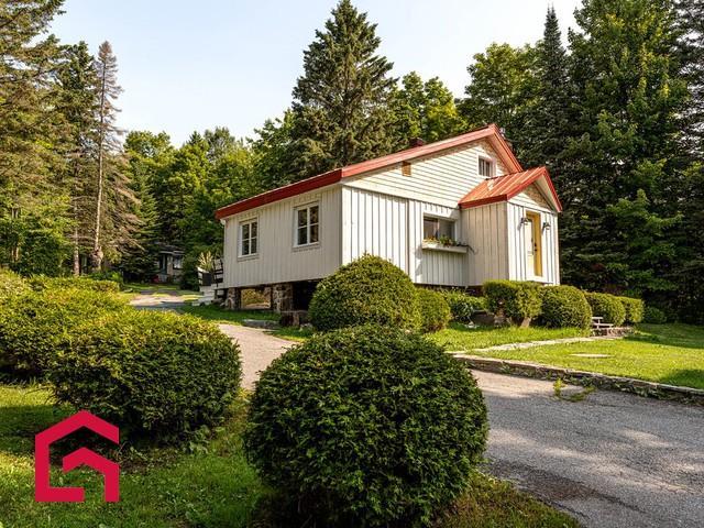 4055 4059 Ch. du Moulin — photo 1