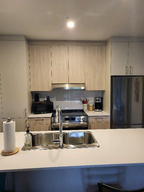 REZ-DE-CHAUSSÉE 3 1/2 GARAGE INTÉRIEUR 3