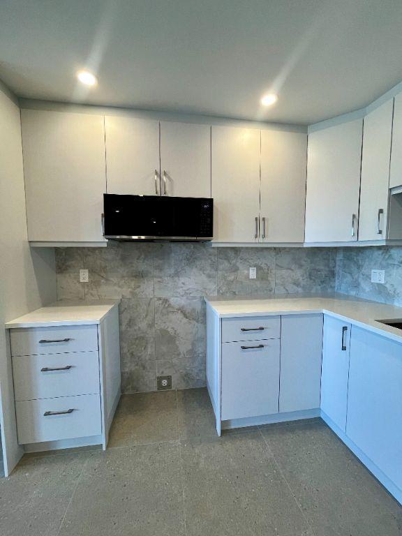 Condo 4 1/2 entièrement rénové vue fleuve 3