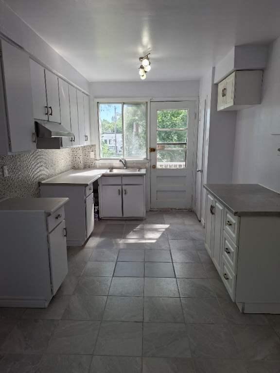 Grand 5 et demi, lumineux haut de duplex a louer 5
