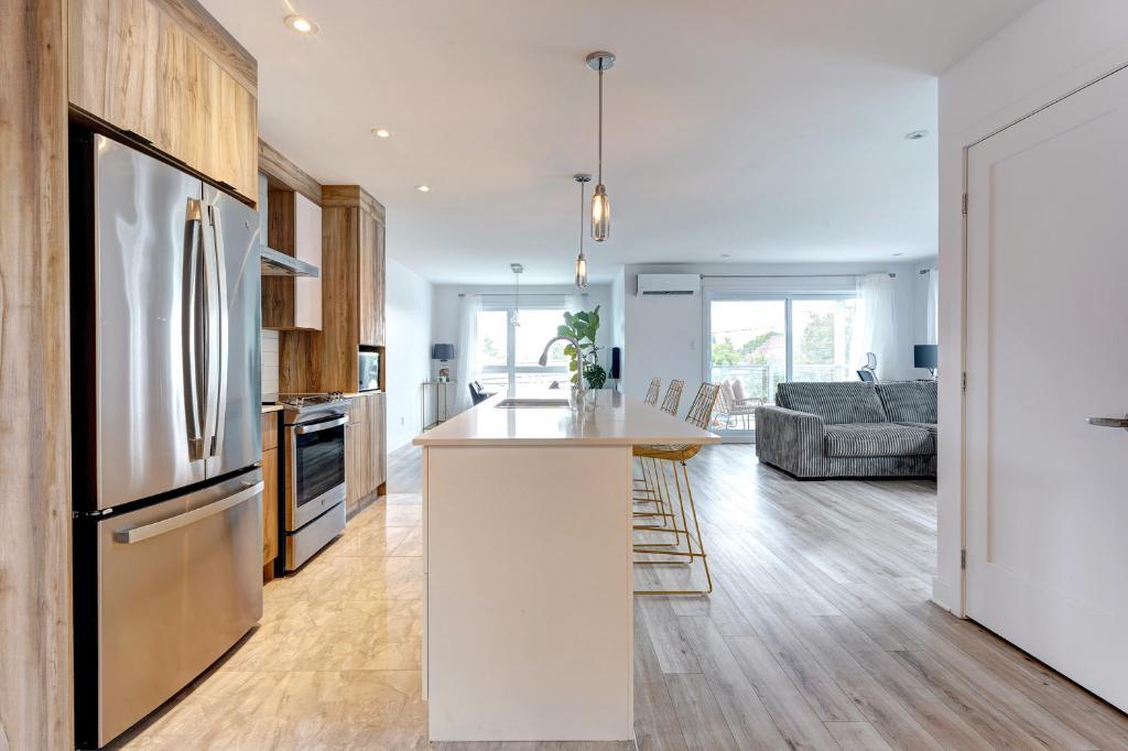 5 1/2 GRAND ET LUXUEUX- NOUVELLE CONSTRUCTION 3