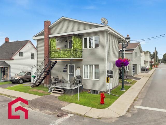 401 403 Rue McCarthy — photo 1