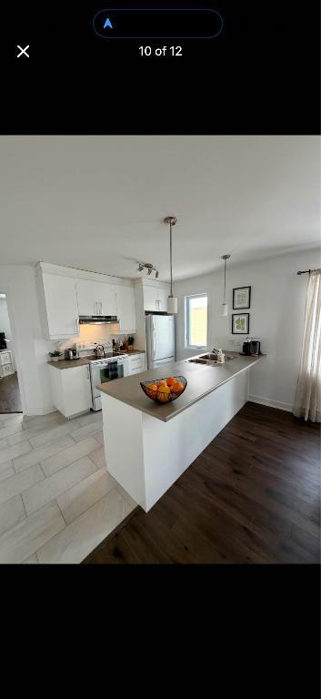 MAGNIFIQUE CONDO 4,5 THURSO octobre 50%!!!! 2