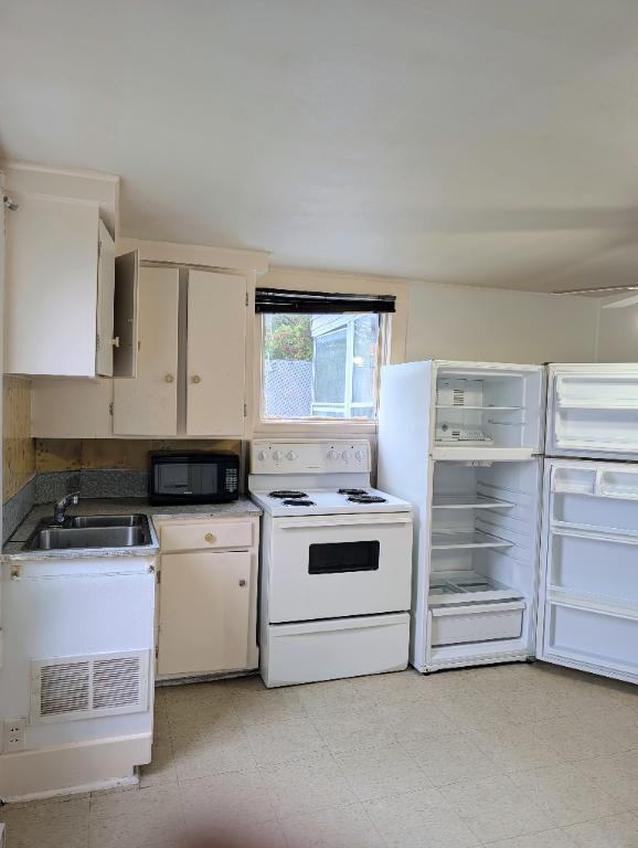 🏠 2½ à louer – 32-2, rue City, Granby 2
