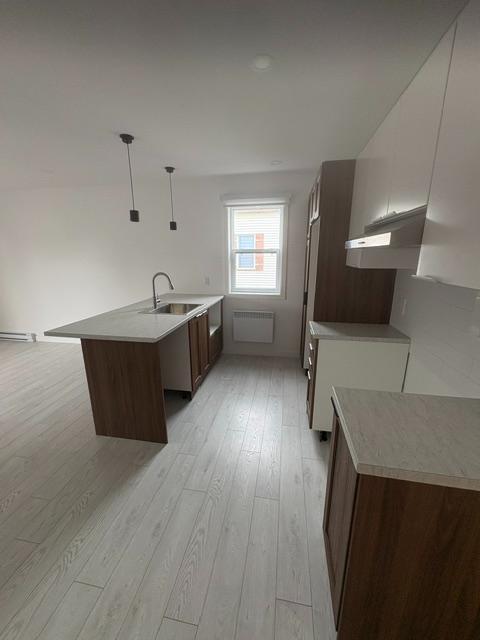 Appartement rénové 3 1/2 - commodité à moins de 1 km 2