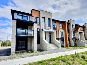 Condo 4 ½ Gare Ste-Rose Laval – 2 chambres, 2 salles de bain – 1 302 pi² – Garage inclus