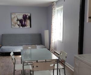 A private bedroom in a clean, fully furnished 4 1/5 for sublet this August — photo 1